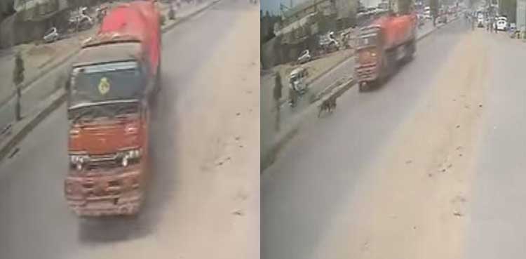 Viral Video: Motorcycle slips under truck after jumping divider in Karachi