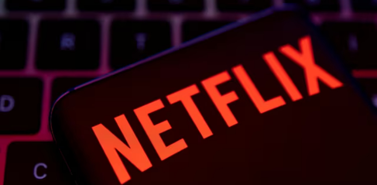 Netflix to buy Discovery's TV and film studios