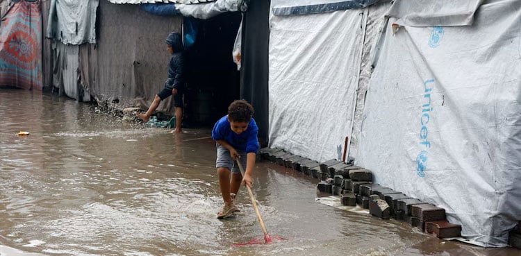 Heavy rains flood Gaza camps as winter looms