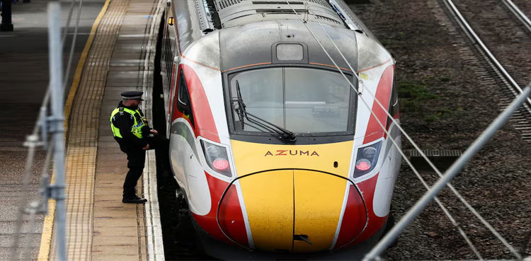 UK police say mass stabbing on train is not terrorist incident, two British men arrested