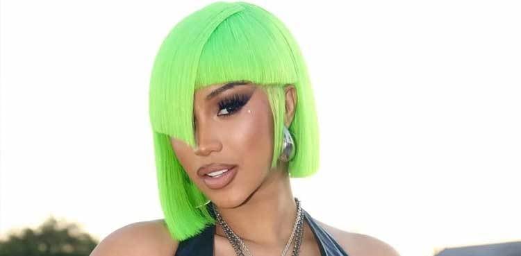 Cardi B unveils her dermal implant and neck piercing