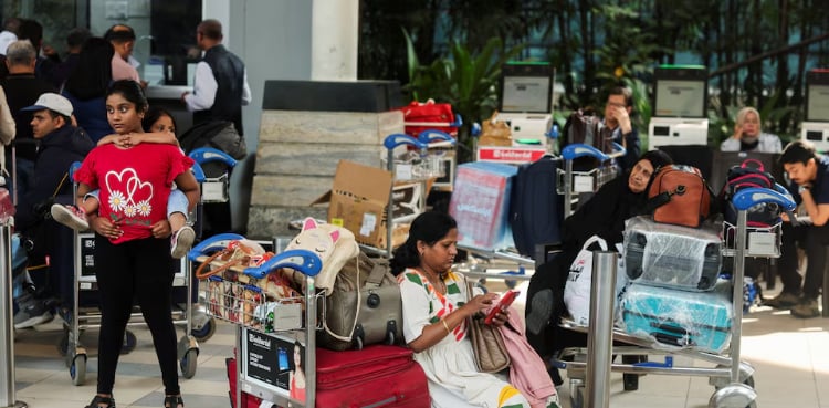 India caps airfares as IndiGo crisis leaves hundreds stranded for fifth day