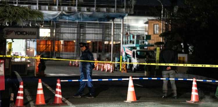 Japan stabbing, liquid spray attack injures 15: official