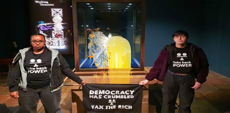 Four arrested after Crown Jewels case defaced with custard released on bail