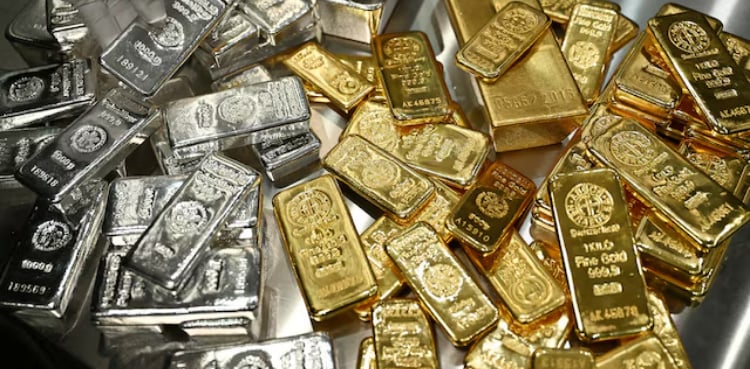 Silver falls from record peak as investors book profits