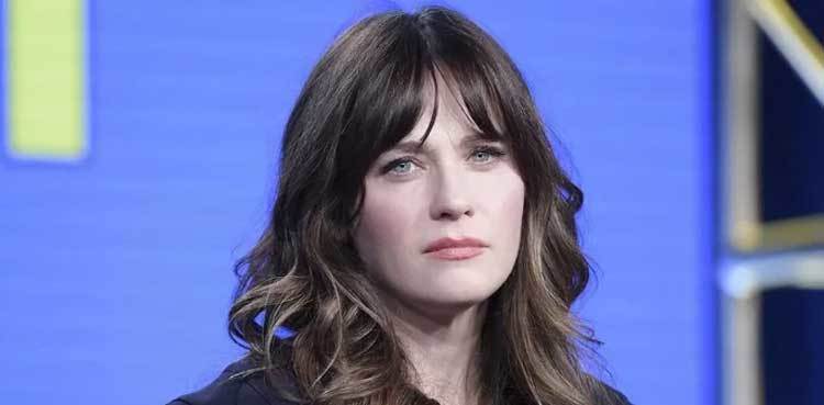 Zooey Deschanel delays fantasy family outing to the 'Candy Cane Forest'