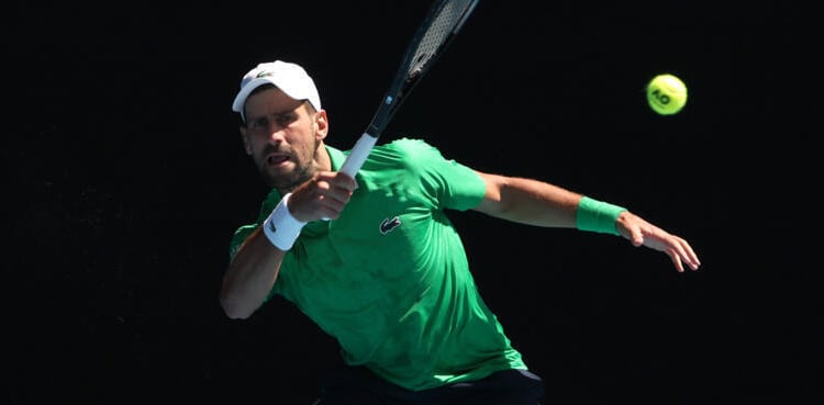 Djokovic eases into Melbourne third round