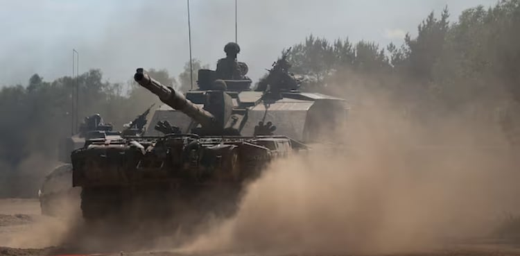 UK needs to step up defence spending faster, PM Starmer says