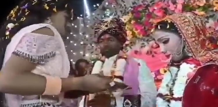 Bride shot on stage during wedding in India