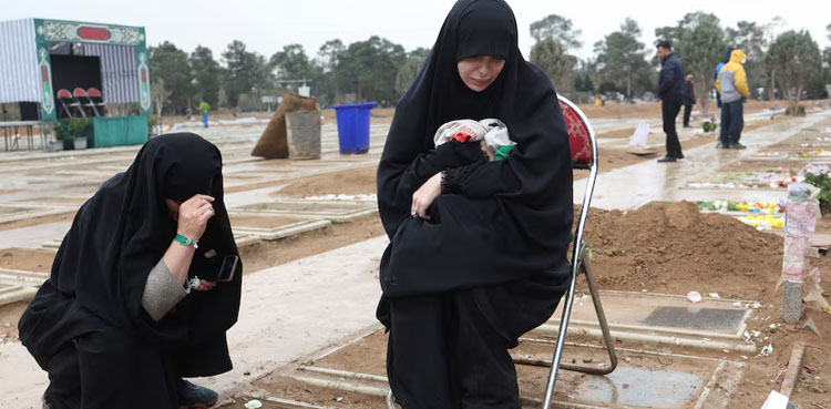 Iran families weep as war martyrs are buried in Tehran