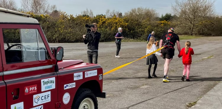 Former UK soldier sets off for 100 km charity walk, pulling a Land Rover