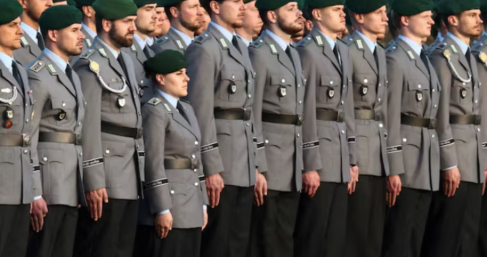 Germany works to clarify new rules on fighting-age men leaving country