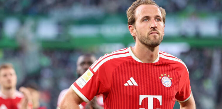 Kane penalty miss as Olise rescues Bayern to pile pressure on Wolfsburg