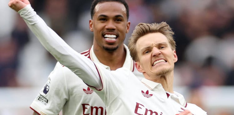 Arsenal scent Premier League glory