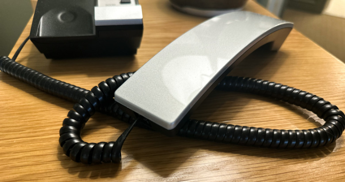 Coiled wires on landline phones prevented tangles and tripping hazards