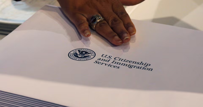 US tells foreigners seeking green cards: Return to your countries to apply