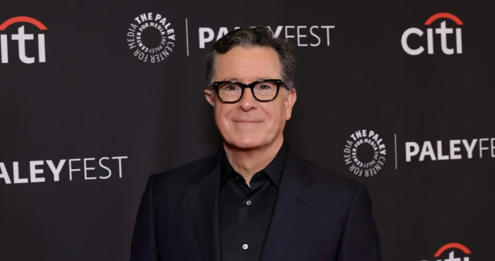 Stephen Colbert burns television set in surprise Michigan show appearance