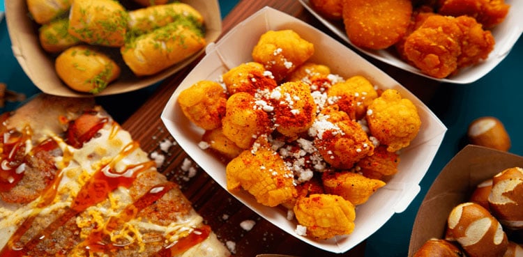 AMC Theatres Rolls Out Street Corn Poppers, Hot Honey Pizza and More in Nationwide Menu Expansion