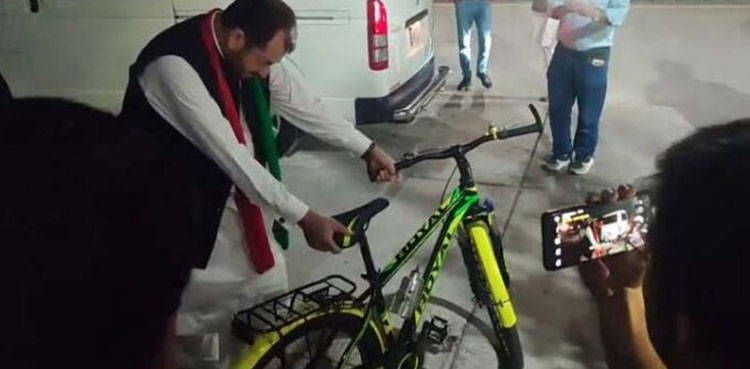PTI lawmaker arrives at parliament on bicycle to protest petrol price hike