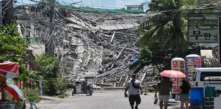 At least one dead in Philippine building collapse, 21 people missing