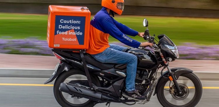 Delivery motorcycles banned on key roads for traffic safety