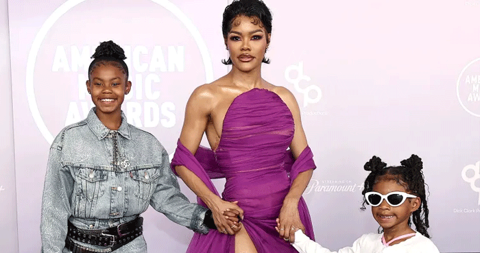 Teyana Taylor walks 2026 AMAs carpet hand-in-hand with her daughters