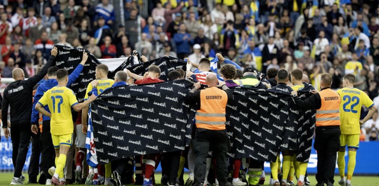 Denmark’s Eriksen in ‘good spirits’ after collapsing during friendly