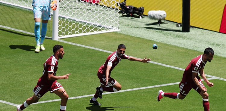 Qatar earn first ever World Cup point with late goal
