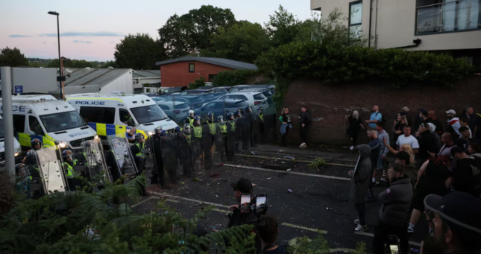 UK police under pressure after dying student was handcuffed