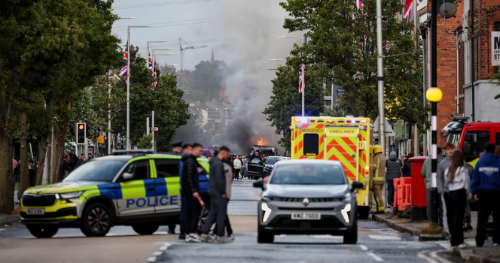 Homes set alight in Belfast anti-immigrant protests after ‘brutal’ knife attack