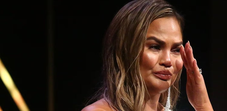 Chrissy Teigen mourns father Ron Teigen Sr. at funeral, shares intimate photos
