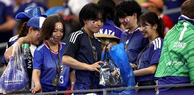 ‘This is our culture’: Japan fans clean up World Cup stadium