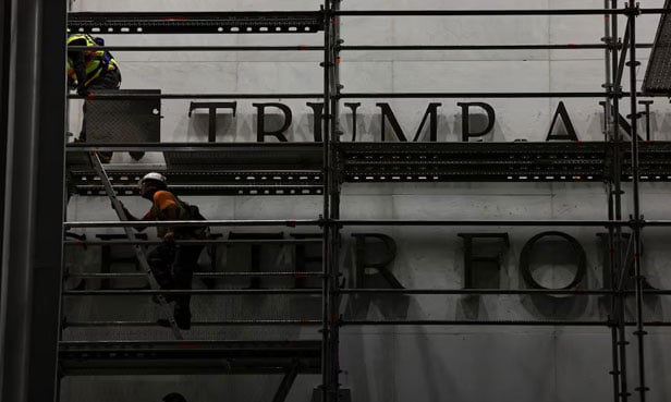 Trump’s name removed from Kennedy Center in predawn operation