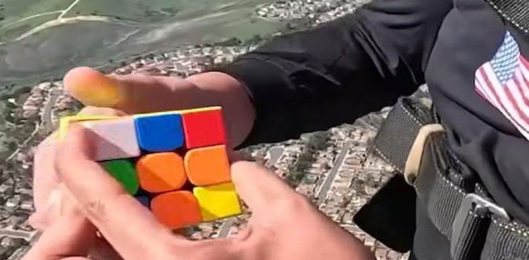 Video: Man sets world record by solving Rubik’s Cube twice while skydiving