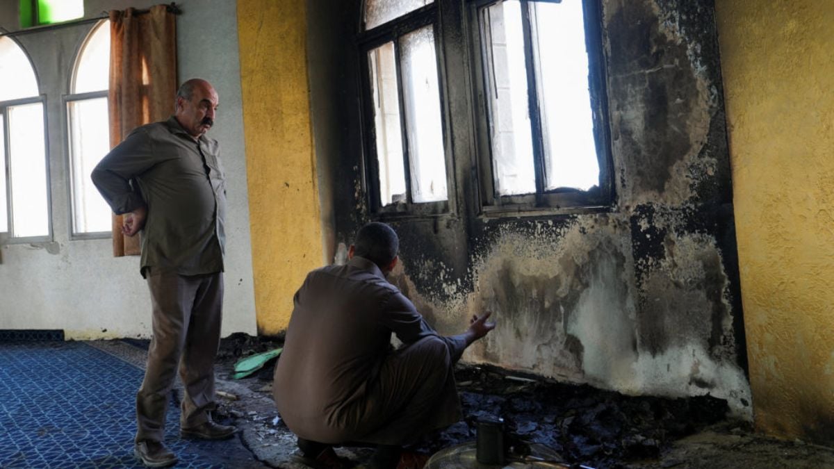 Palestinians say Israeli settlers torch 2 mosques in West Bank