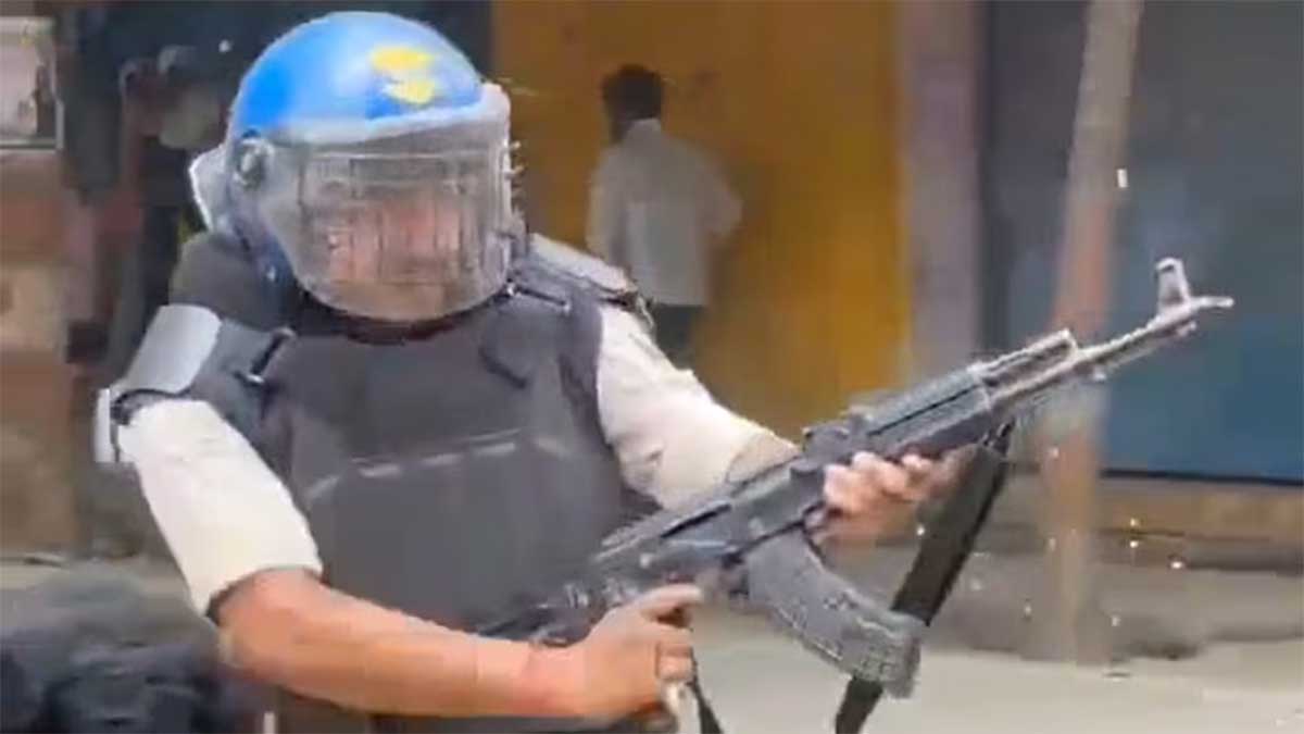 India suspends policeman for firing AK-47 at student protesters