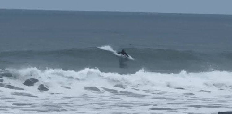 Great White Shark breaches just feet behind boogie boarder off Newport beach