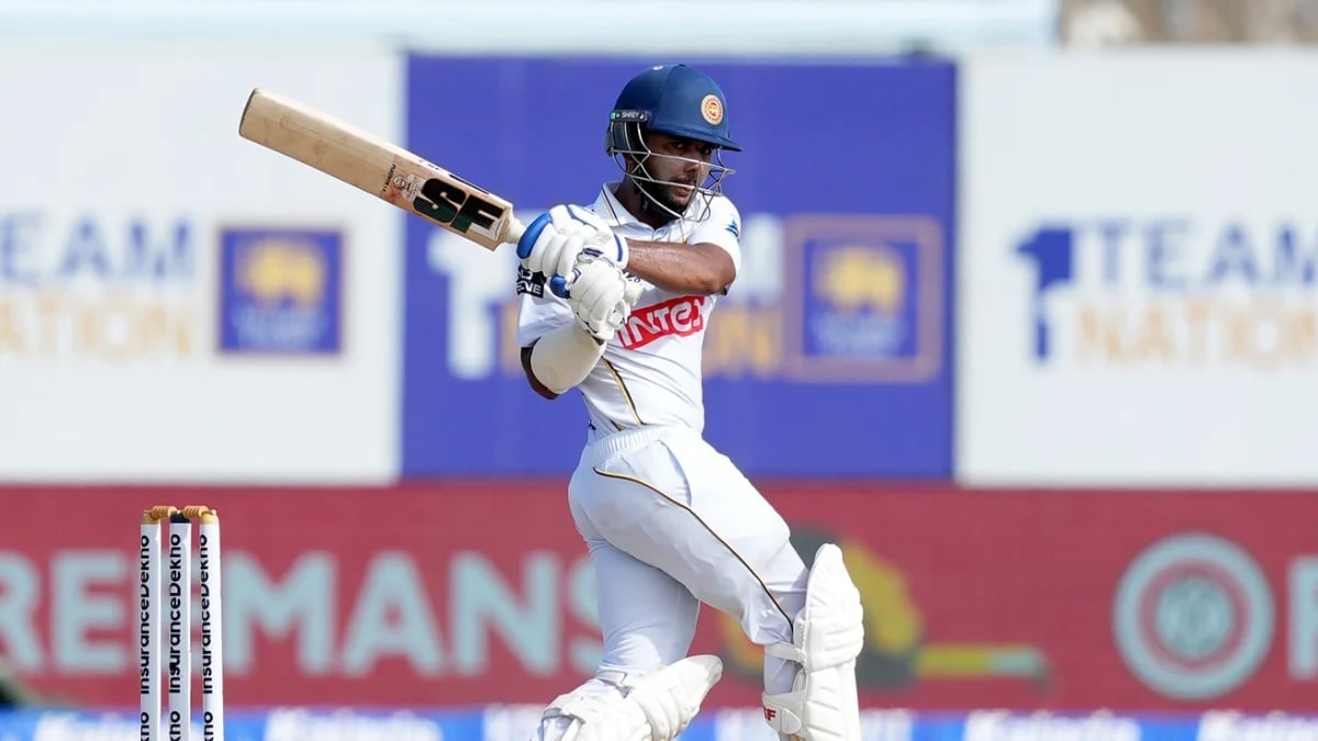 Rain halts India push after Dinusha century lifts Sri Lanka