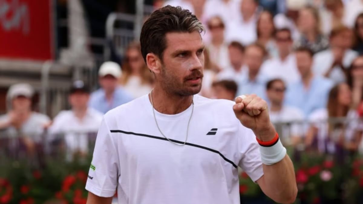 Battling Norrie survives match point to oust de Minaur