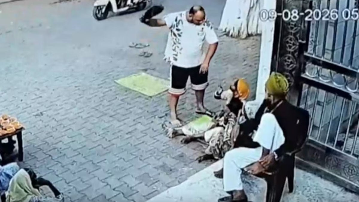 Video: Helpless woman beaten with slippers outside temple